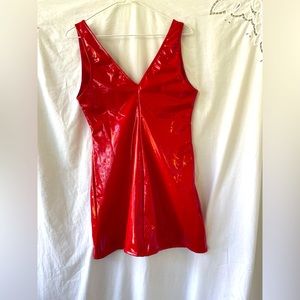 2 pieces 1 mini dress & 1 bodysuit. Red shiny material.95% polyester 5% spandex